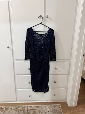 Marina Navy Lace Sheath Dress with Three-Quarter Sleeves.